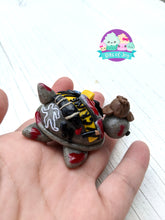 Load image into Gallery viewer, True Crime Inspired Turtle Figurine