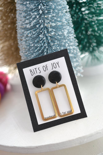 Black and gold dangle studs